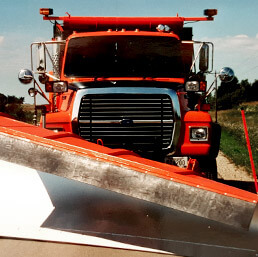 industrial snow plow falls plows