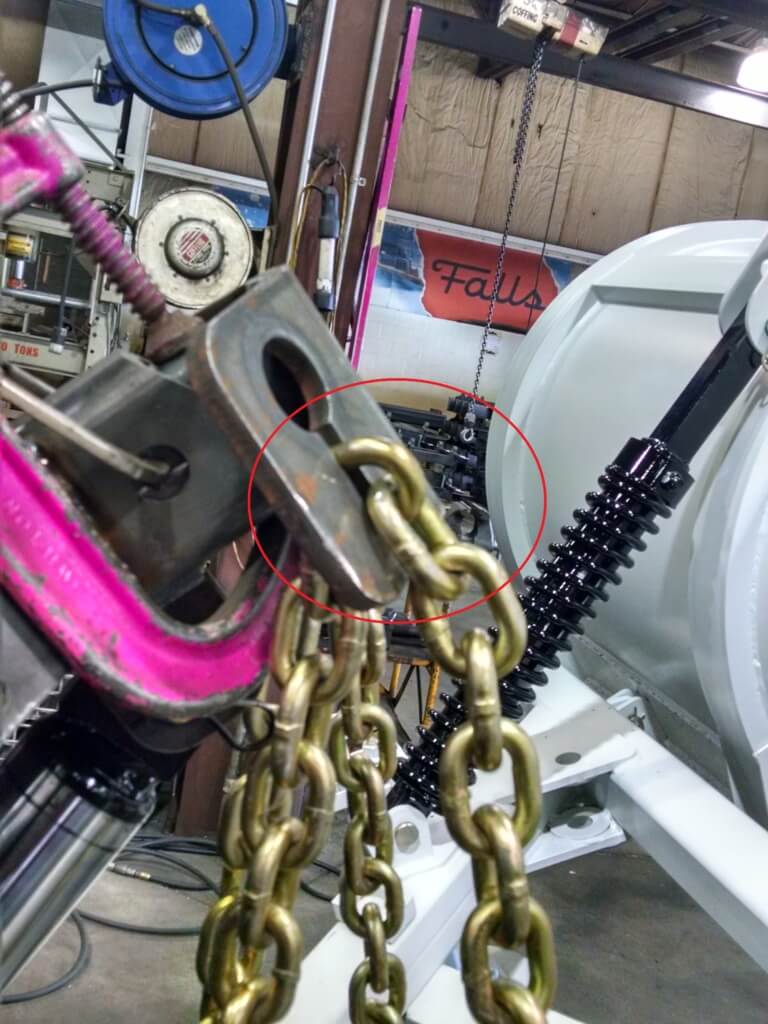 IMPROPER CHAIN ALIGNMENT circled link